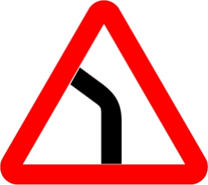 Знак Опасный поворот налево